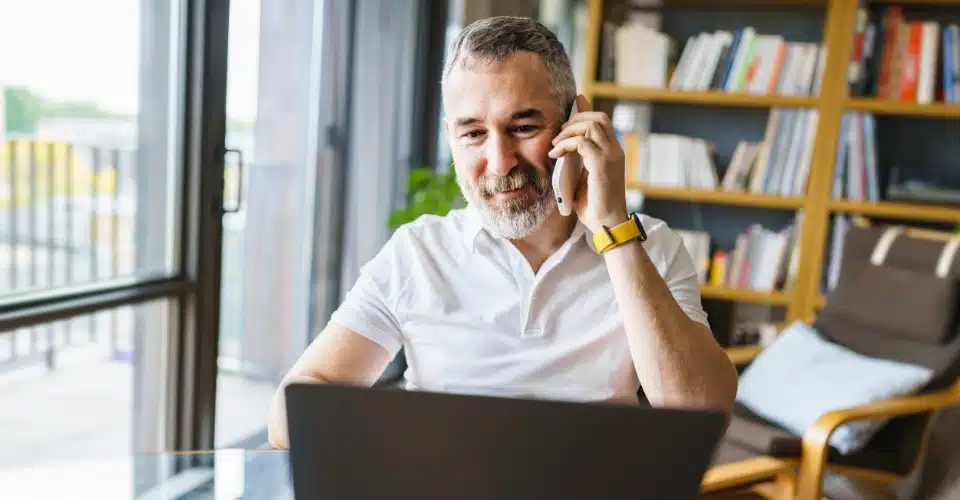 A man making a phone call to a VA disability attorney