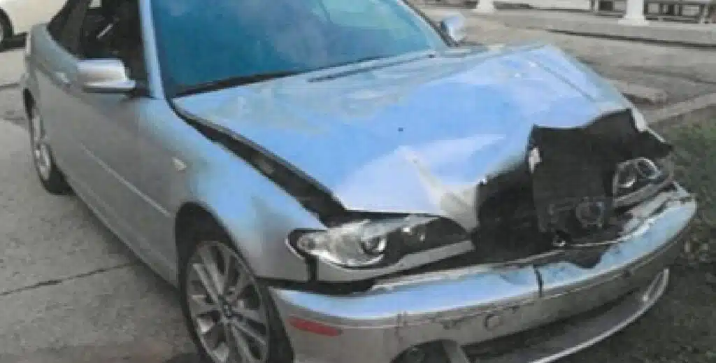 A car with extensive front end damage