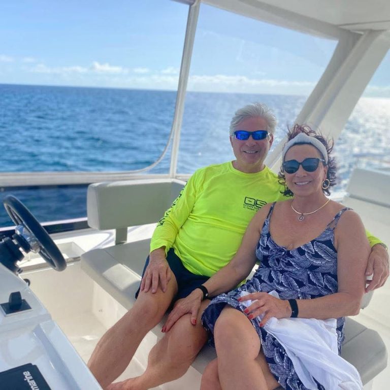 Karl Truman, founding attorney, and client on a boat, representing maritime law services in Louisville,