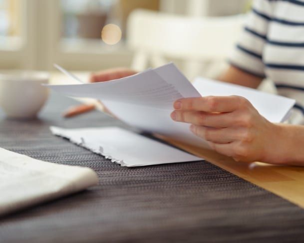 looking over crash reports from a car accident
