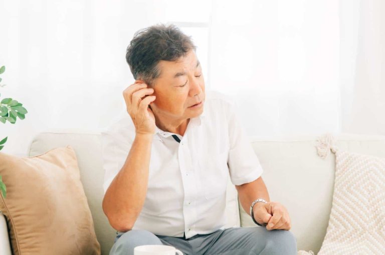 Veteran experiencing hearing loss, seeking VA disability benefits and legal assistance in Louisville, KY.