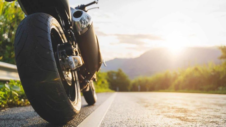 Motorcycle on road, representing motorcycle accident claims and rider safety in Kentucky and Indiana.
